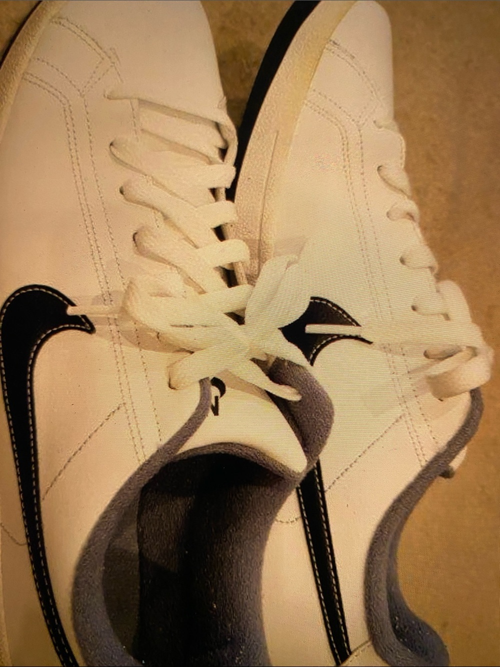 Nike White Sneakers with Black Swoosh - Men's